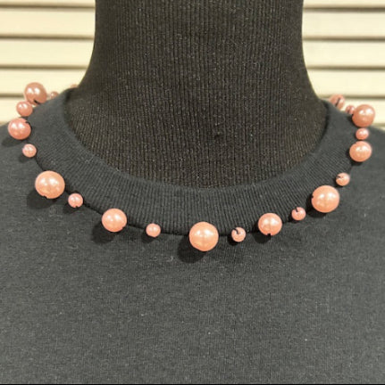 Black Short Sleeved T Shirt with Pink Pearls at Neck