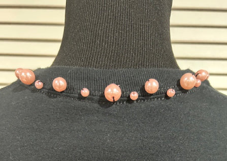 Black Short Sleeved T Shirt with Pink Pearls at Neck
